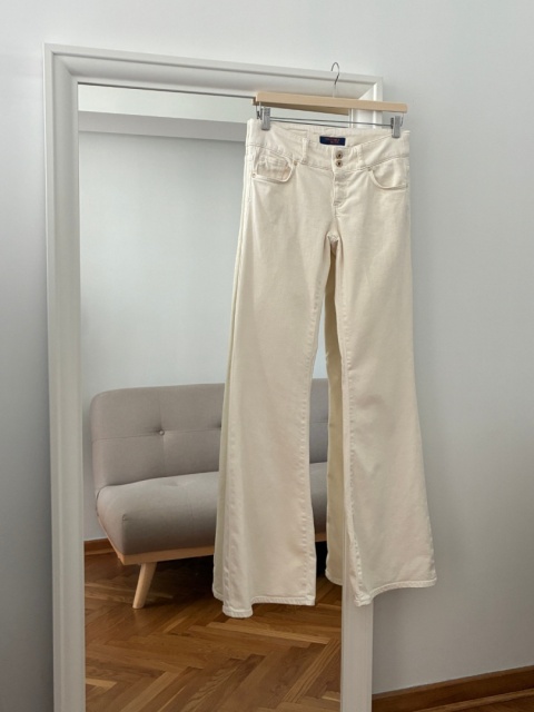 Kremowe jeansy dzwony Trussardi Jeans
